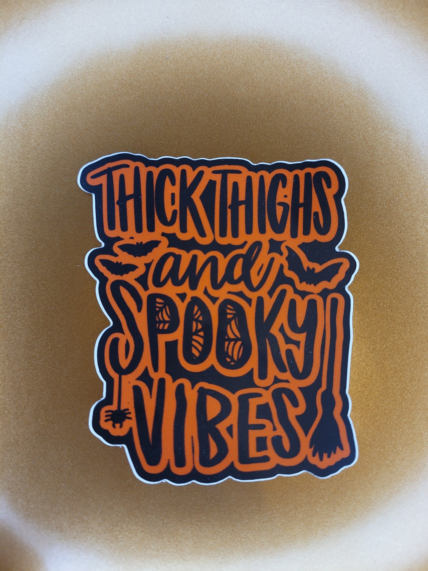Thick Thighs and Spooky Vibes Sticker